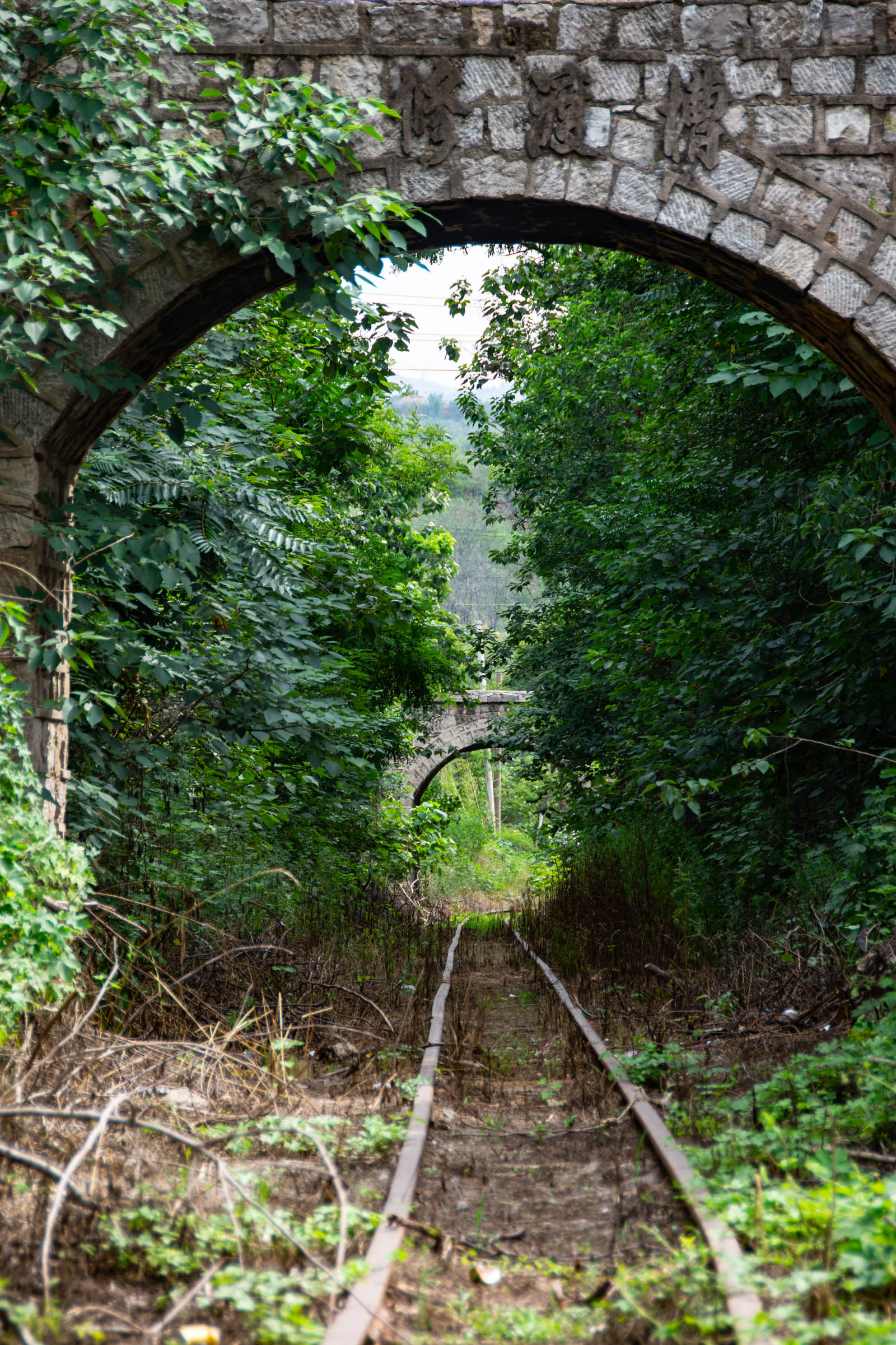 Aqueduct crossing narrow-gauge railway